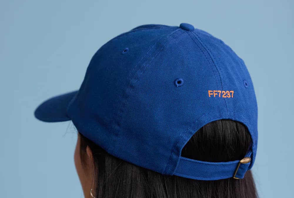 Figma swag of a baseball cap with the hex code on the back